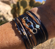 Load image into Gallery viewer, 14k yellow gold featured in navy; paired with Pleiades (left) and Vlepo (right)