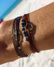 Load image into Gallery viewer, 14k yellow gold featured in rust; paired with Pleiades in 14k yellow gold featured in brown