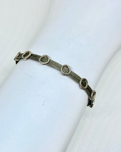 Sterling silver featured in taupe, single wrap (circles spread apart)
