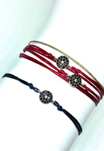 Load image into Gallery viewer, Sterling silver double mini burst featured in crimson (original with sparkly cord) (top) and sterling silver mini burst featured in black (mona) (bottom)
