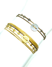 Load image into Gallery viewer, Sterling silver with crimp beads featured in taupe (mona cord) (top) and yellow gold vermeil with crimp beads featured in sand (original with sparkly cord) (bottom)