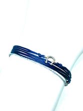 Load image into Gallery viewer, Sterling silver horseshoe featured in navy (original with sparkly cord)