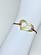 Load image into Gallery viewer, Brass heart featured in crimson