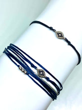 Load image into Gallery viewer, Sterling silver diamond shape featured in navy (mona) (top) and sterling silver diamond shape featured in navy (original with sparkly cord) (bottom)