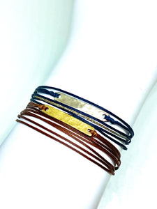 Sterling silver featured in navy (top) and yellow gold vermeil featured in rust (bottom)