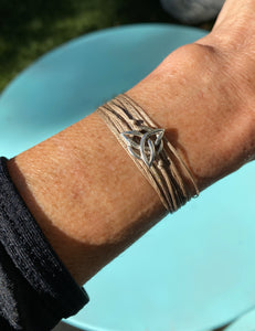 Sterling silver featured in khaki, double wrap