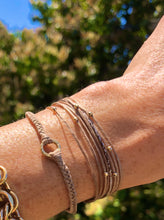 Load image into Gallery viewer, 14k gold featured in khaki; paired with Pleiades