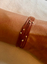Load image into Gallery viewer, Polished 14k yellow gold featured in rust, polished bead