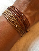 Load image into Gallery viewer, Stack two together: 14k yellow gold polished bead featured in rust (top) and 14k yellow gold polished bead featured in champagne (bottom)