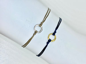 Sterling silver in khaki (left); Yellow gold vermeil in navy (right)