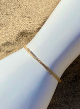 Load image into Gallery viewer, 14k yellow gold double sided diamonds double bar featured in khaki, mona design