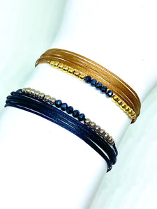 Yellow gold vermeil featured in champagne (original) and sterling silver featured in navy (orignal)