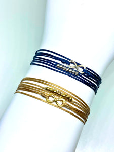 Sterling silver featured in navy (top) and yellow gold vermeil featured in champagne (bottom)