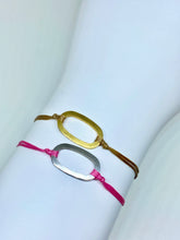 Load image into Gallery viewer, Brass featured in champagne (top) and zamak featured in hot pink (bottom)