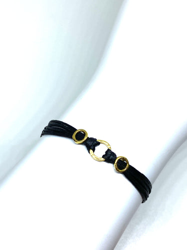 Yellow gold vermeil featured in black