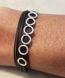 Sterling silver featured in black, double wrap