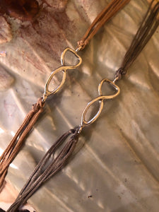 Sterling silver featured in champagne (left) and taupe (right)