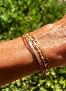 Yellow gold vermeil 1 crimp row featured in champagne (original with sparkly cord)