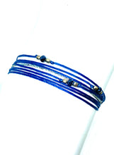 Load image into Gallery viewer, Sterling silver trea featured in blue (original with sparkly cord)