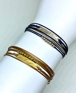 Sterling silver featured in navy (top) and yellow gold vermeil featured in champagne (bottom)