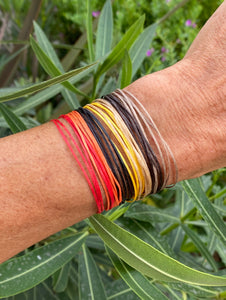Multiple bracelets, each in its own color