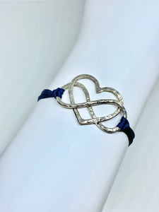 Sterling silver featured in navy