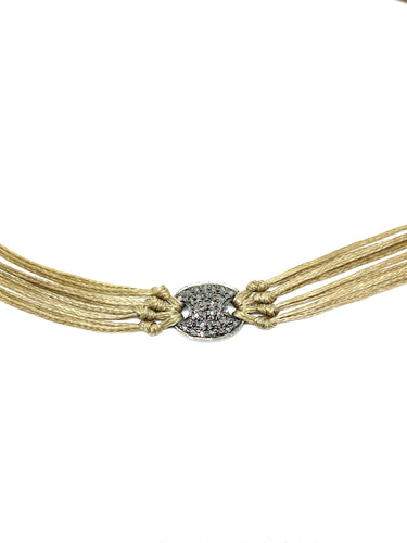 Sterling silver featured in khaki