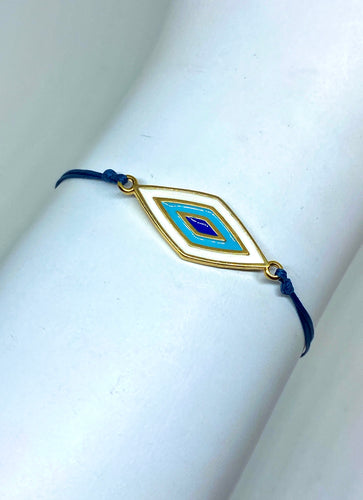 Yellow gold plated zamak featured in blue