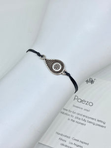 Zamak dots featured in black