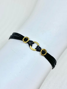 Yellow gold vermeil featured in black