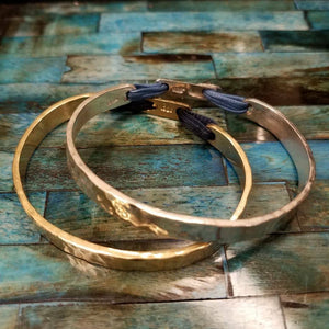 Sterling silver  (featured in blue on top) and yellow gold vermeil (featured in navy on bottom)