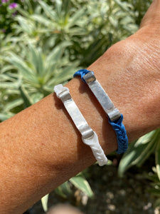 Sterling silver featured in white (left) and blue (right)