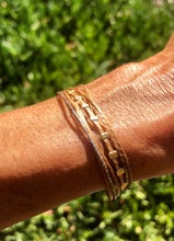 Load image into Gallery viewer, Yellow gold vermeil 1 crimp row featured in champagne (original with sparkly cord)