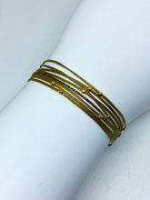 Load image into Gallery viewer, 14k yellow gold polished bead featured in khaki