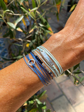 Load image into Gallery viewer, Sterling silver featured in blue; paired with Harra
